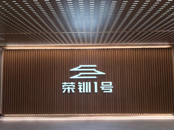 Integrated light turns the identity into part of the environment.